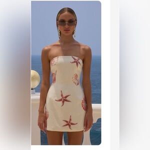 Cream sequined mini dress with seashells and starfish